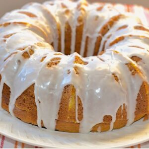 pumpkin spice bundt cake on a white platter