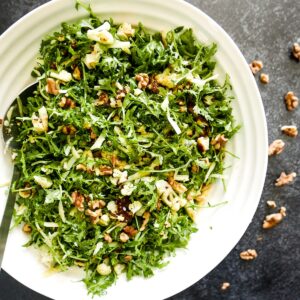 roasted cauliflower salad in a large white bowl