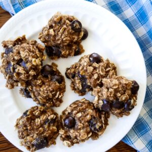 healthy banana peanut butter cookies arranged on a white plate