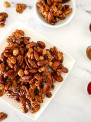 spiced candied nuts on a small plate