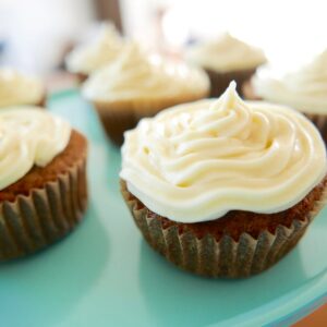 carrot cake cupcakes on a platter.