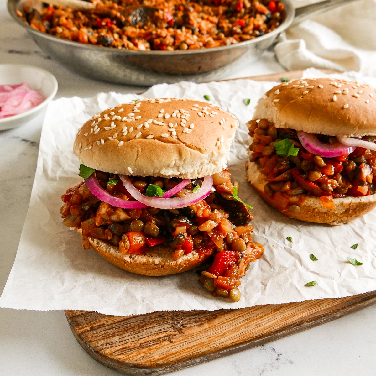 Vegetarian sloppy joes arranged on a cutting board.