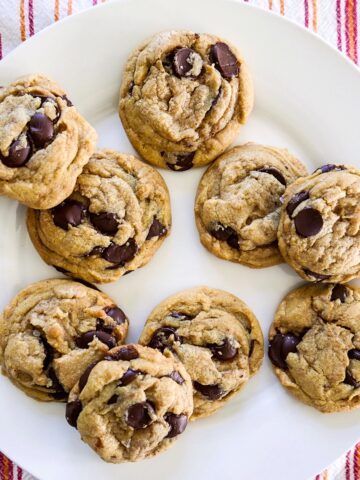 brown butter chocolate chip cookies arranged on a white platter