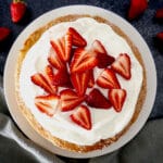 strawberry cornmeal cake on a white platter