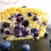 blueberry lemon ricotta poundcake cut open on a platter