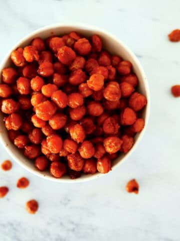 bbq roasted chickpeas in a white cup.