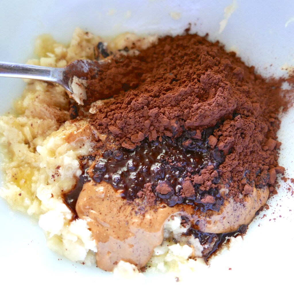 bananas, cocoa powder, peanut butter, and vanilla extract in a mixing bowl
