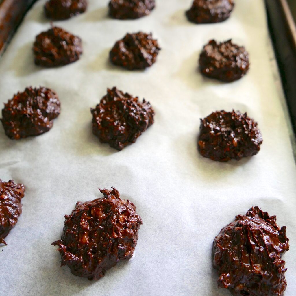 peanut butter fudge cookies arranged on a baking sheet