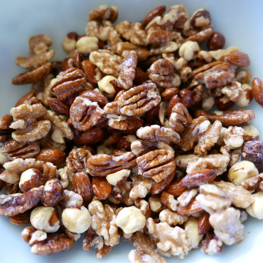 mixing bowl with candied nuts being prepared