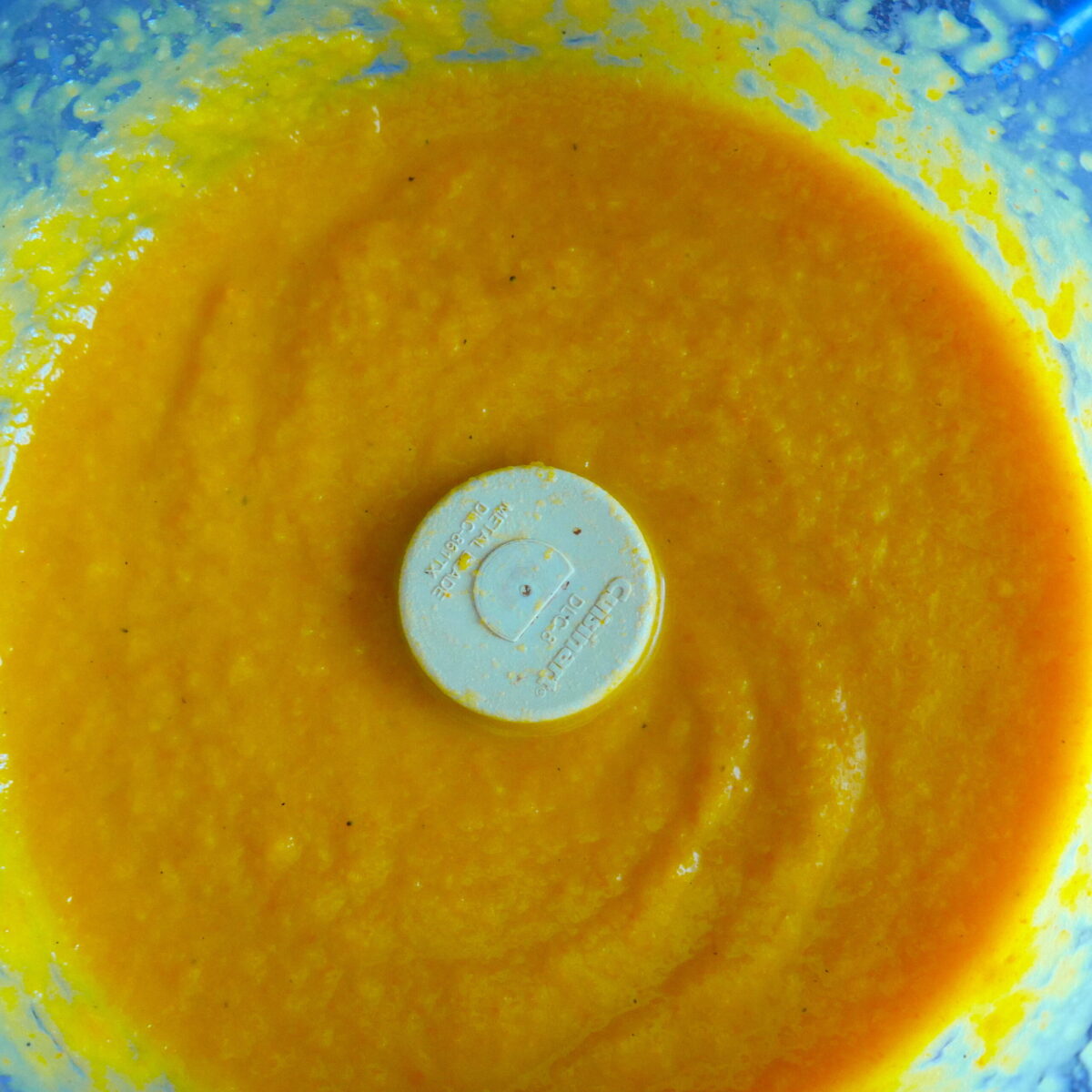 pureed squash soup in a food processor.