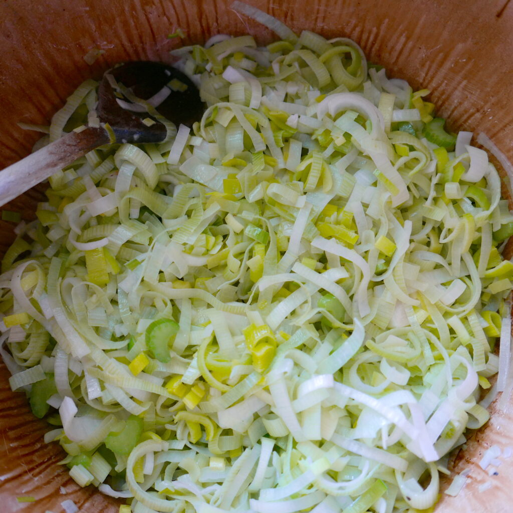 sliced leeks in a large Dutch oven