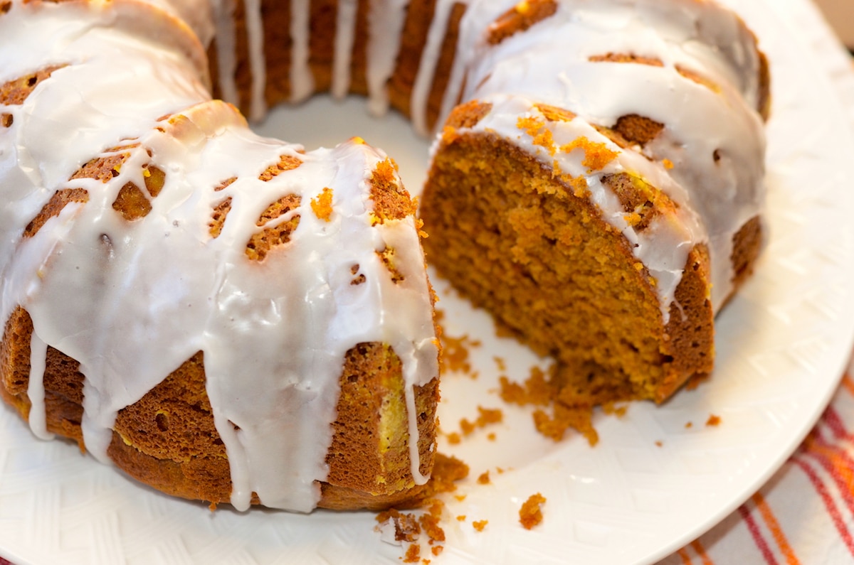 pumpkin spice bundt cake on a white platter