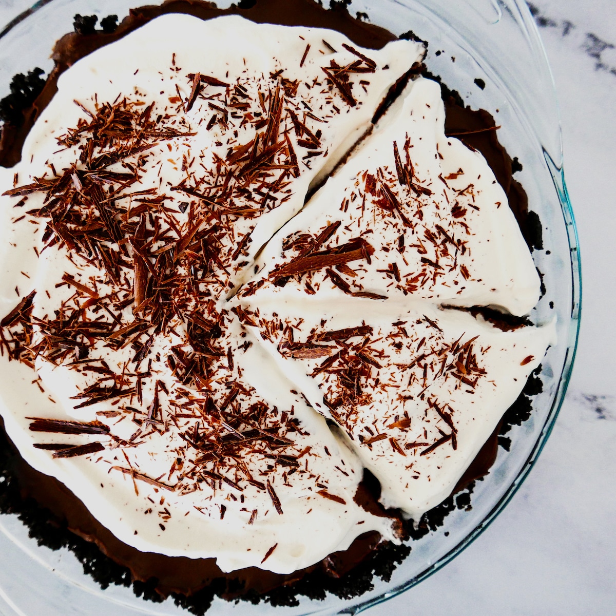 chocolate-cream-pie.jpg chocolate cream pie with two pieces cut