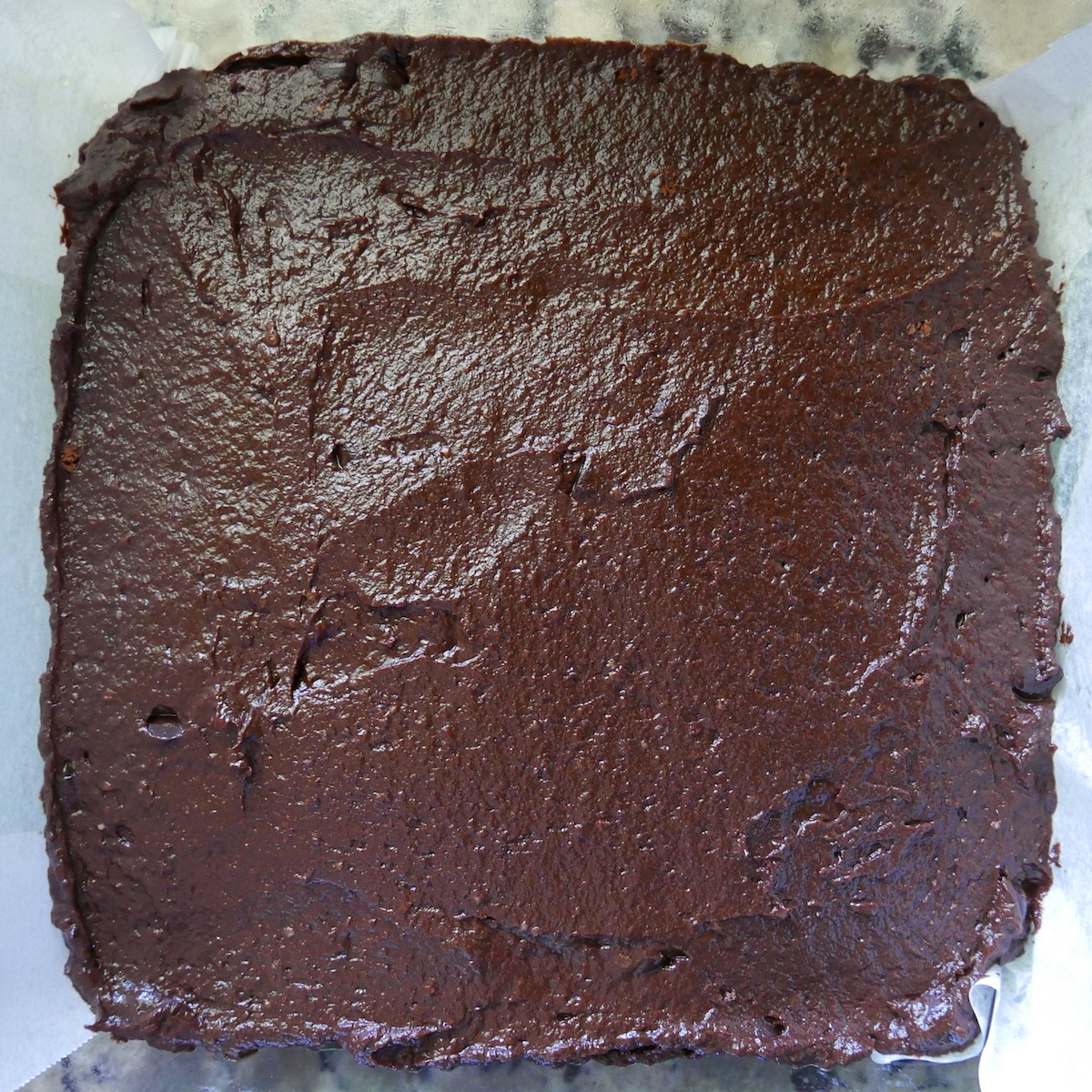 vegan pumpkin brownie batter in a pan.