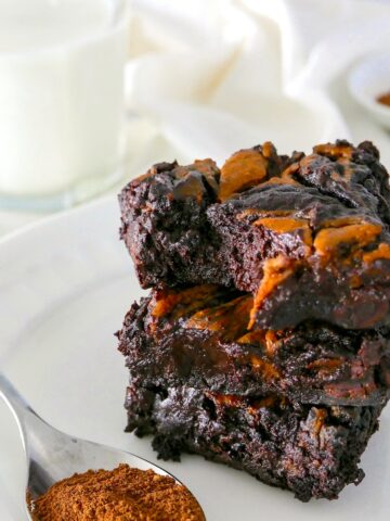 vegan pumpkin brownies stacked three high