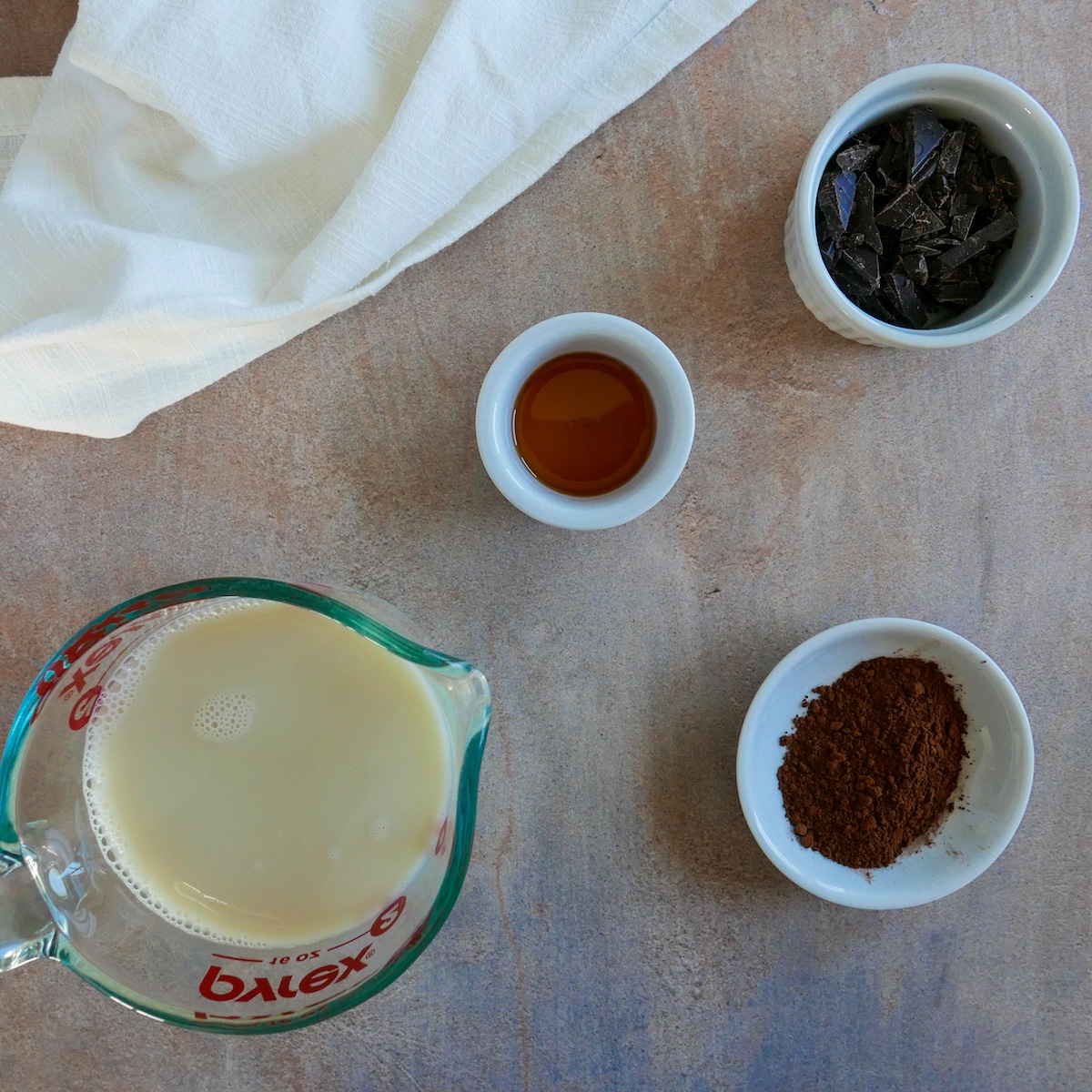 ingredients.jpg Hot chocolate ingredients arranged on a table.