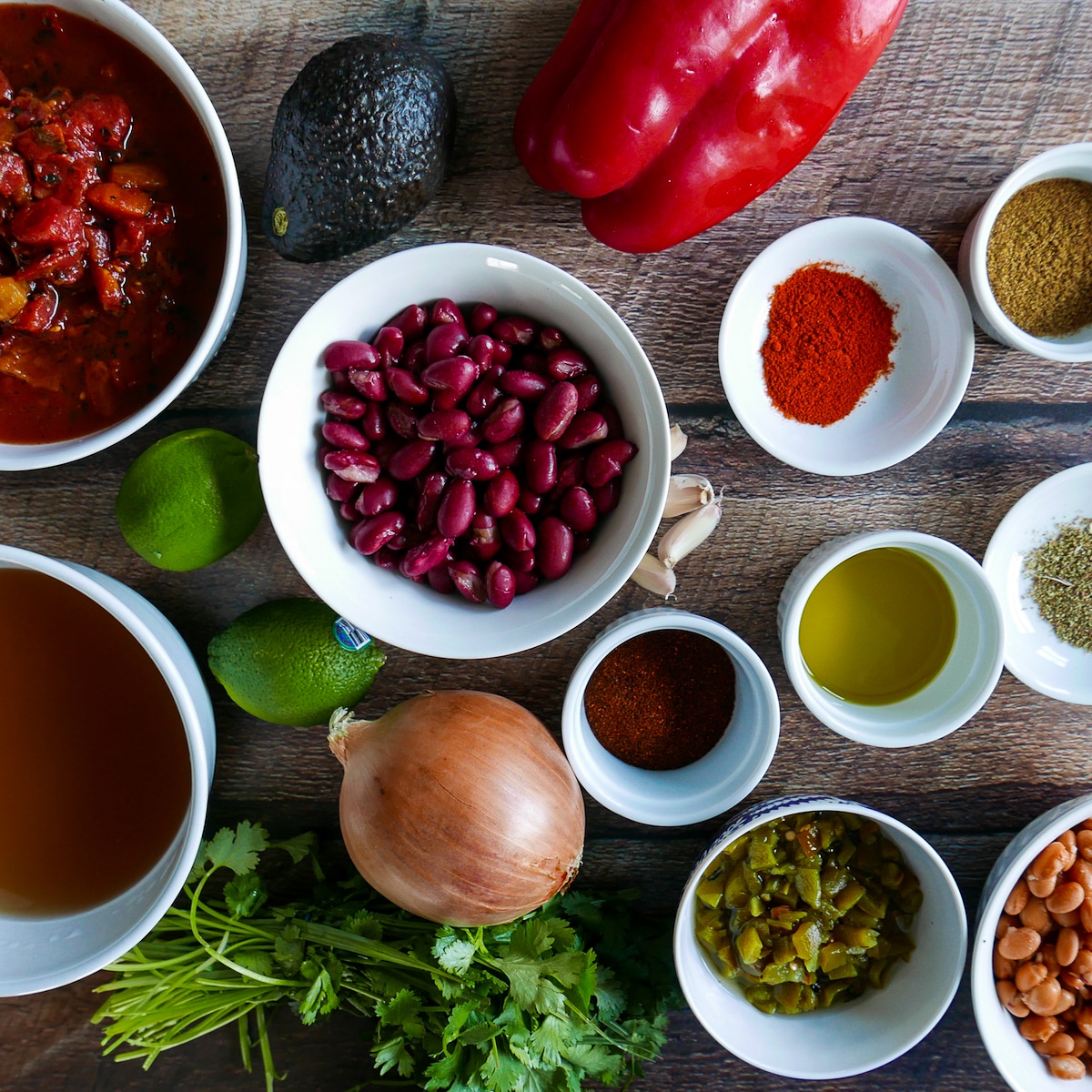 chili ingredients arranged on a table.