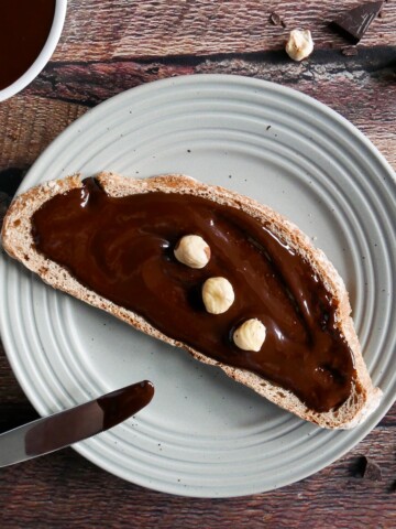 homemade vegan hazelnut spread on a piece of toast.