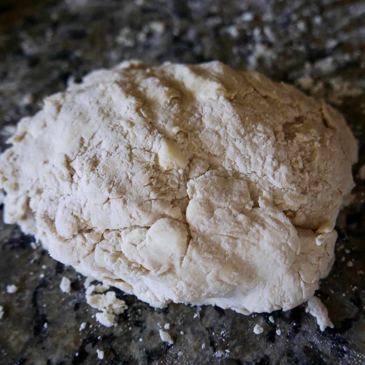 biscuit dough being folded a second time.