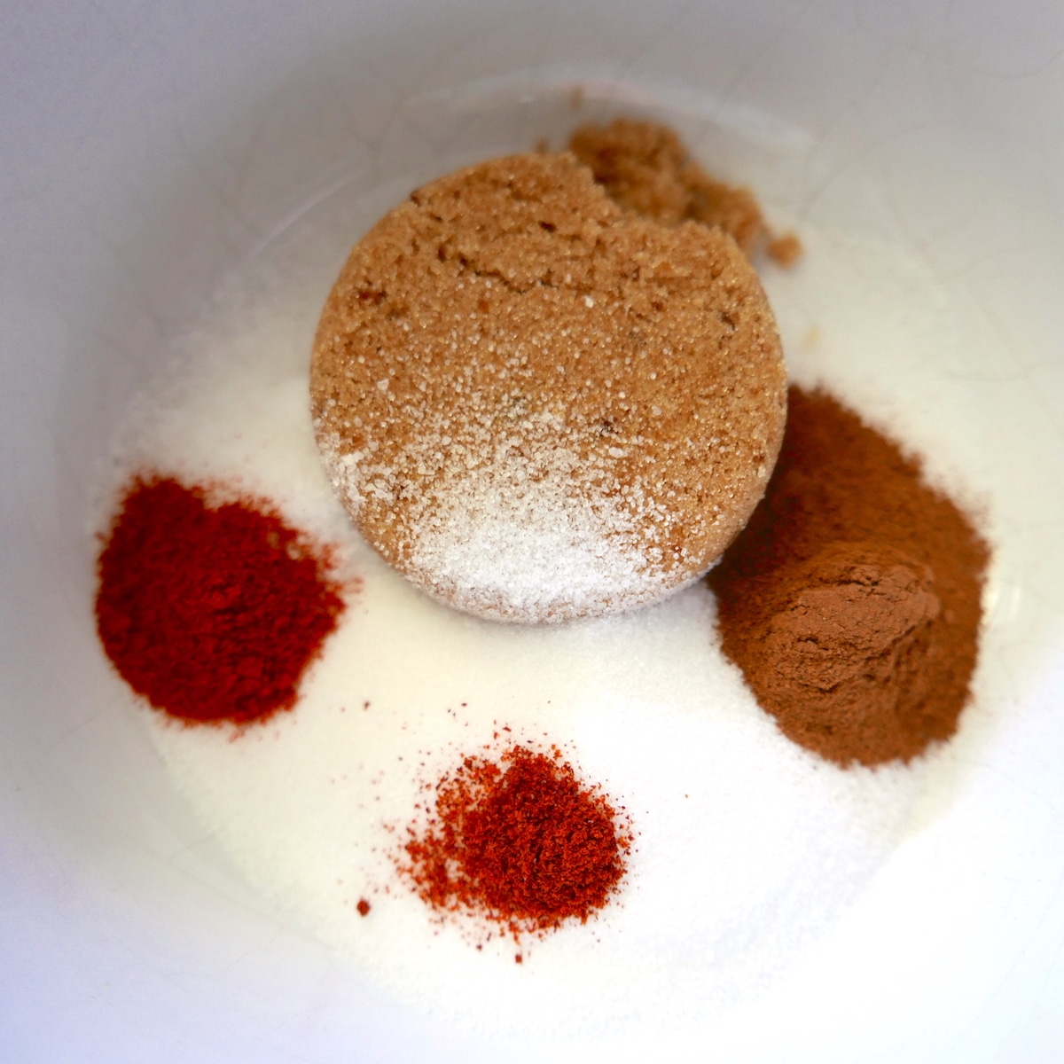 sugar and spices in a mixing bowl.
