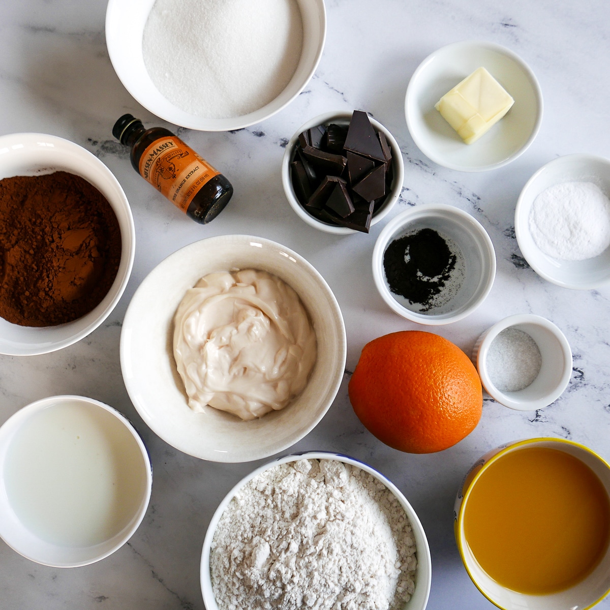 Cake ingredients arranged on a table.