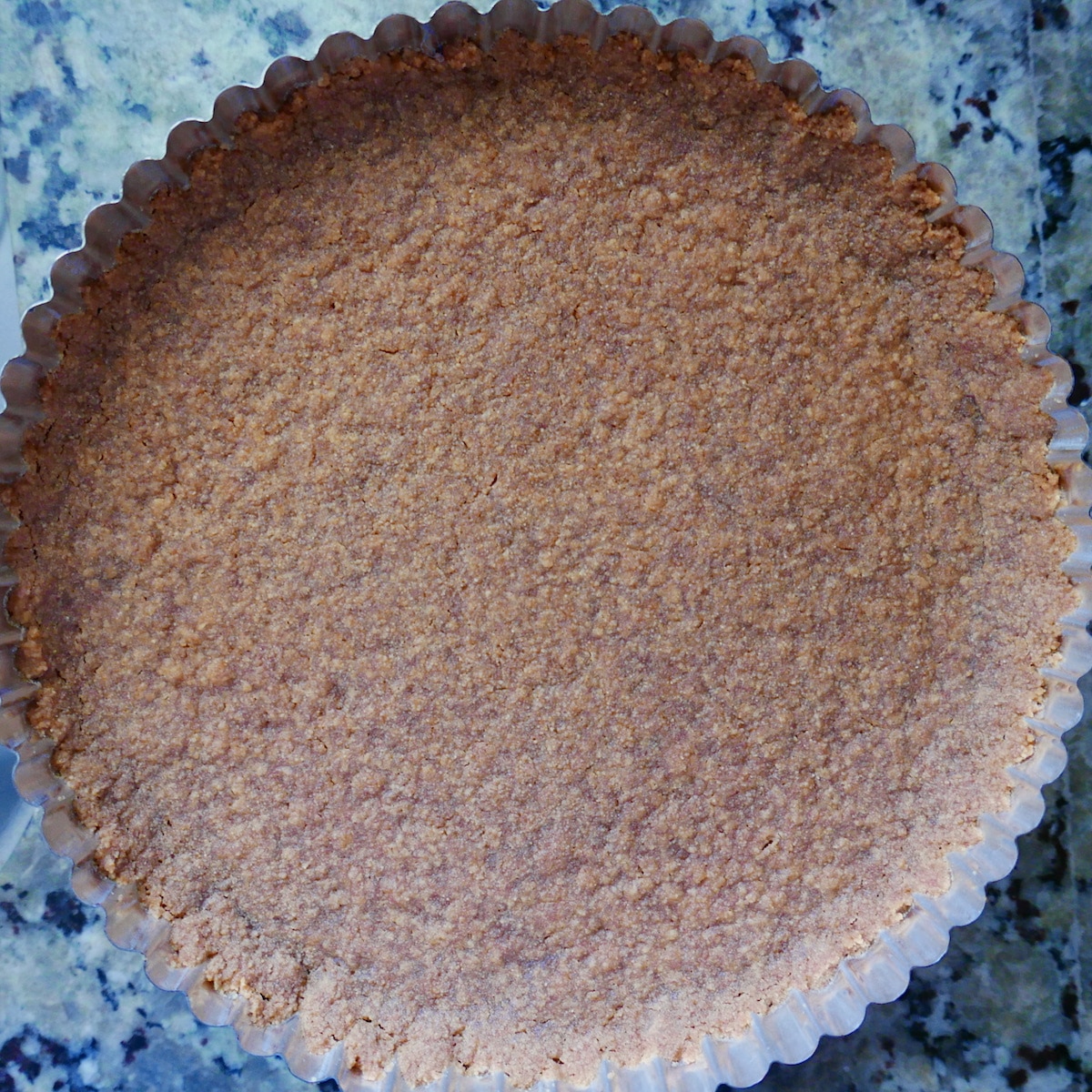 Baked graham crust in tart pan.