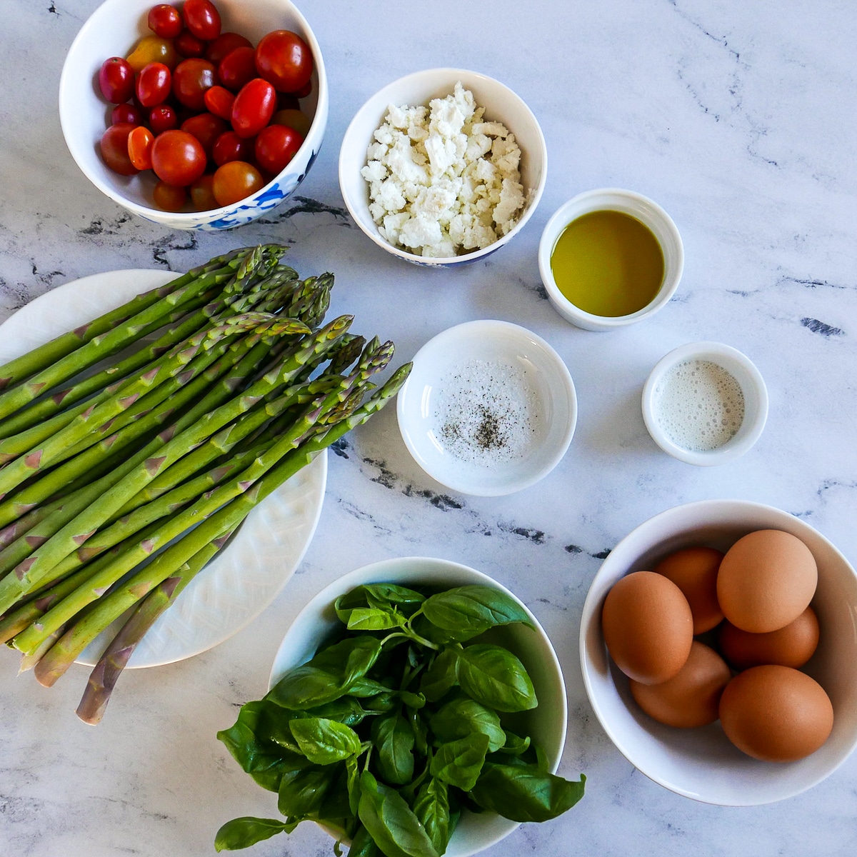 frittata-ingredients.jpg frittata ingredients laid out on a table.