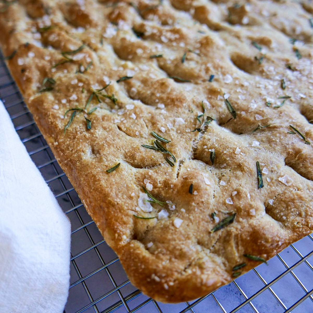 rosemary focaccia on a cooling rack