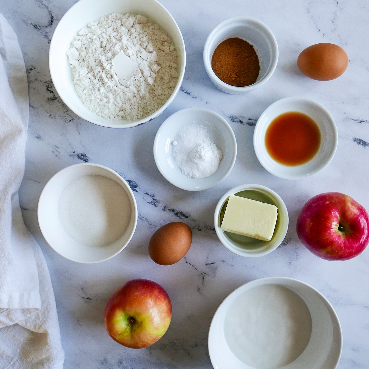 muffin ingredients arranged on a table.