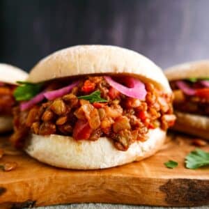 Hearty lentil sloppy joes arranged on a platter.