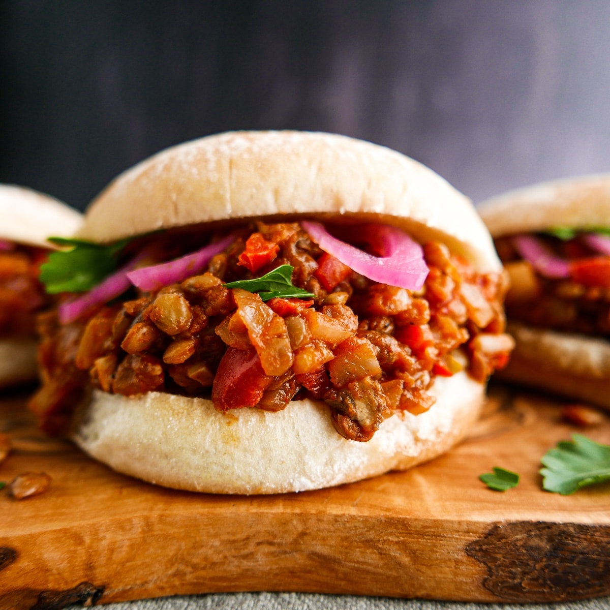 Hearty lentil sloppy joes arranged on a platter.