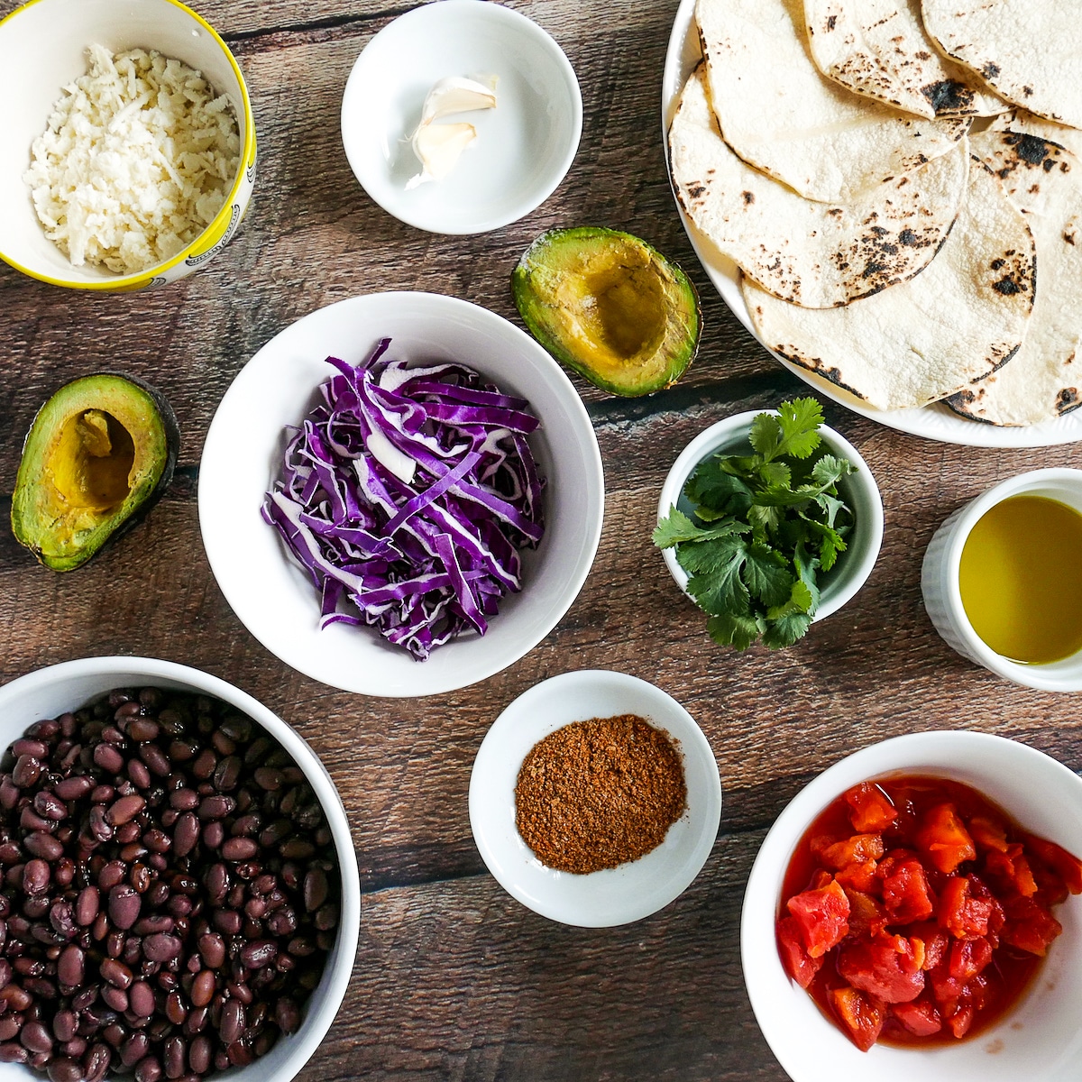 taco ingredients arranged on a table.