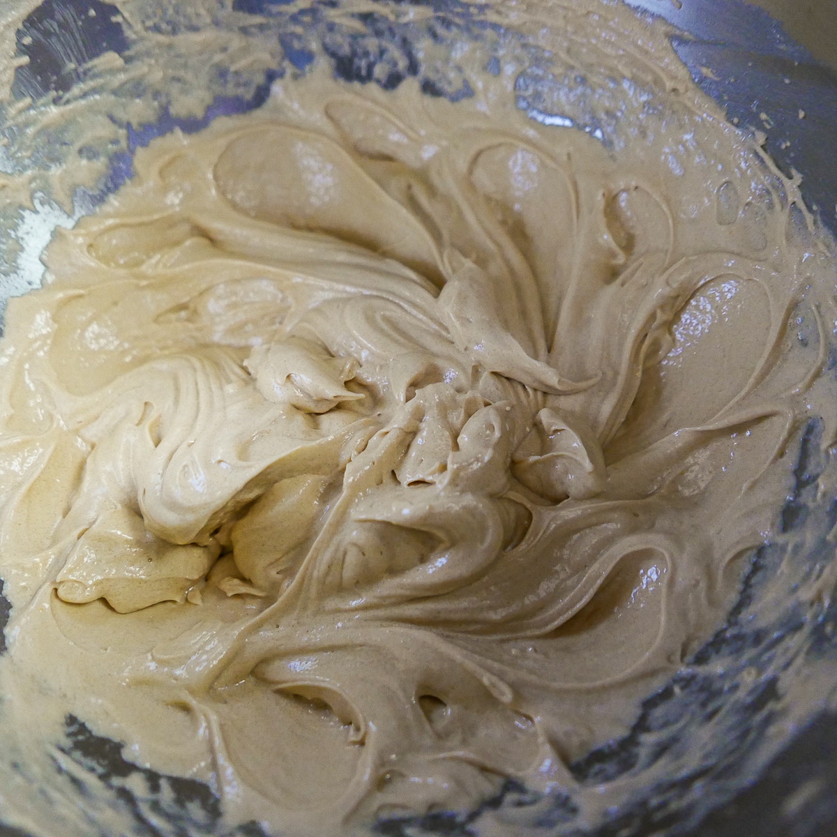 butter-sugar-and-eggs-mixed-together.jpg vegan butter, sugar, and eggs mixed together in mixing bowl.