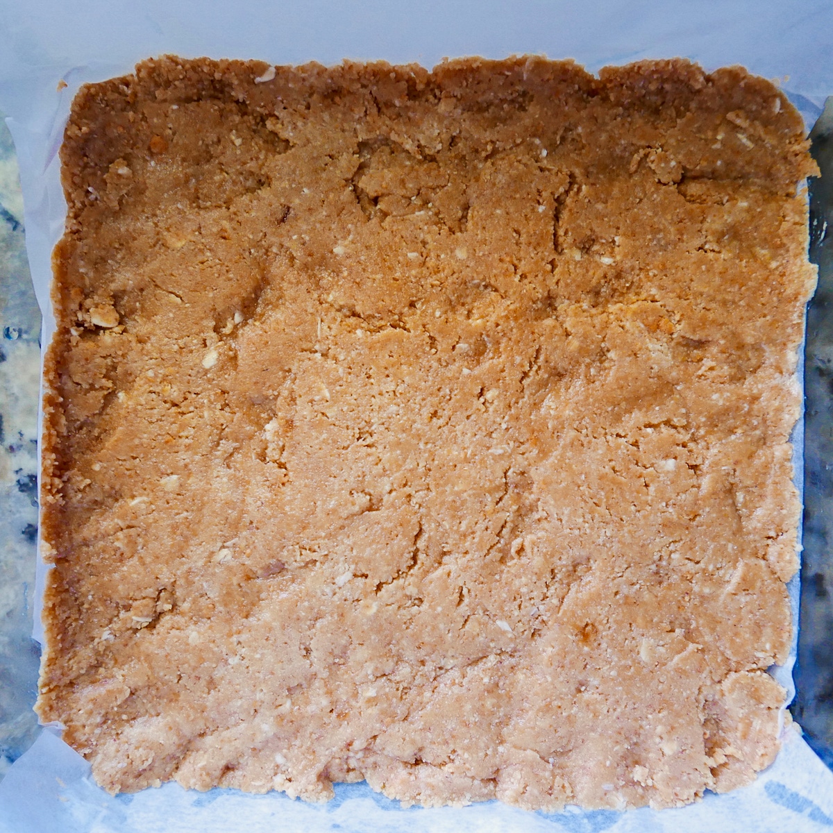 graham cracker base in a baking dish.