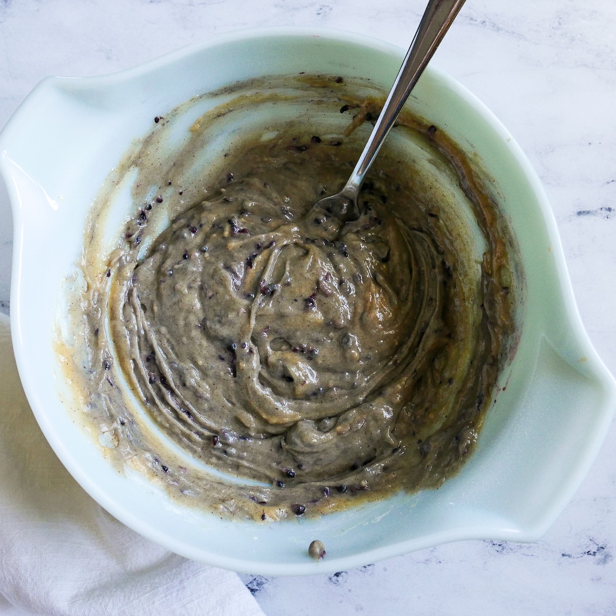 muffin batter in a mixing bowl.