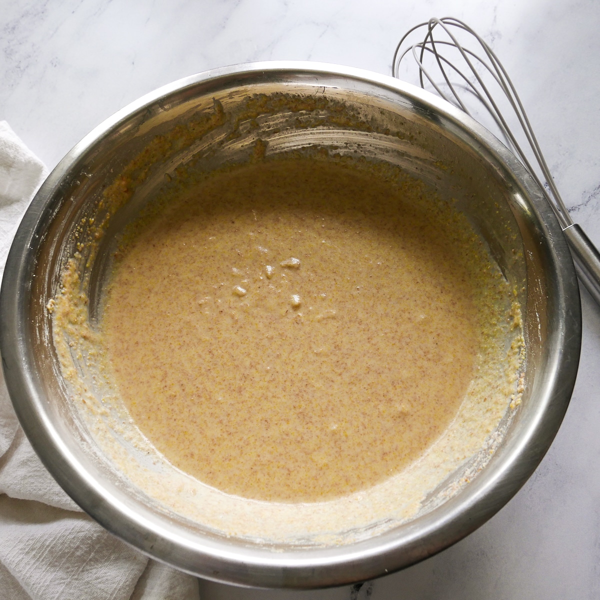 Honey, eggs, butter, and salt mixed into cornbread batter.