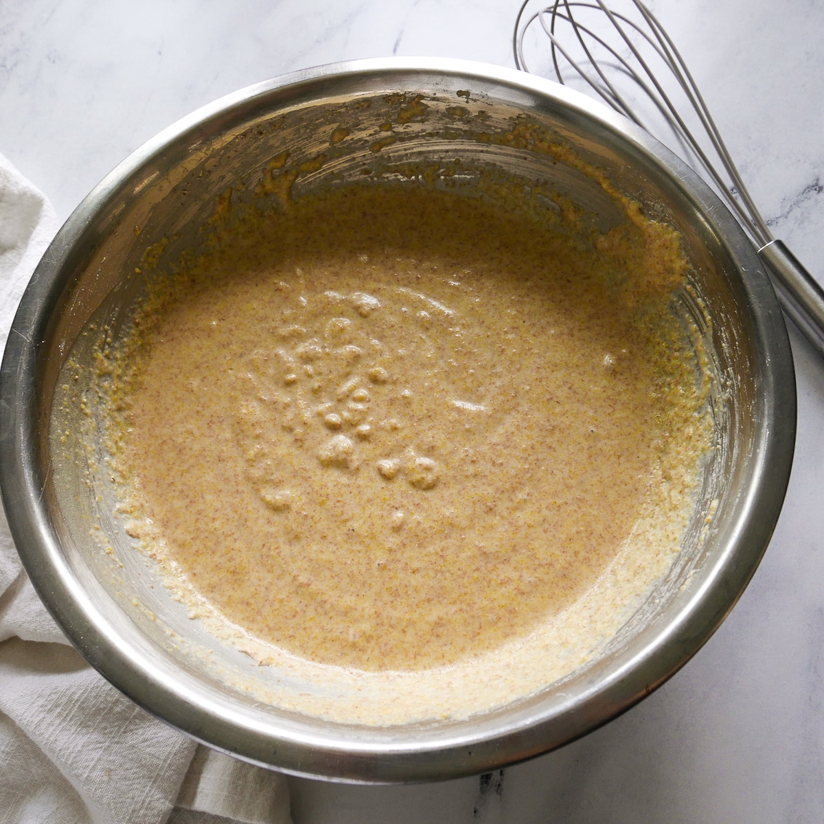 Baking powder and baking soda mixed into cornbread batter.