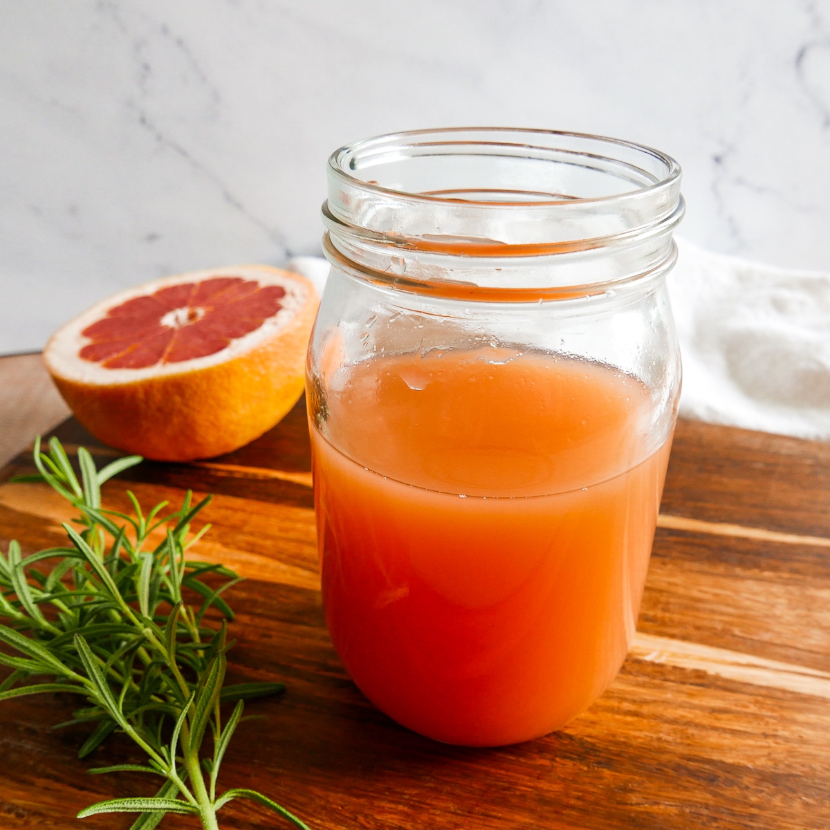 vodka and grapefruit juice in a container after being shaken. 