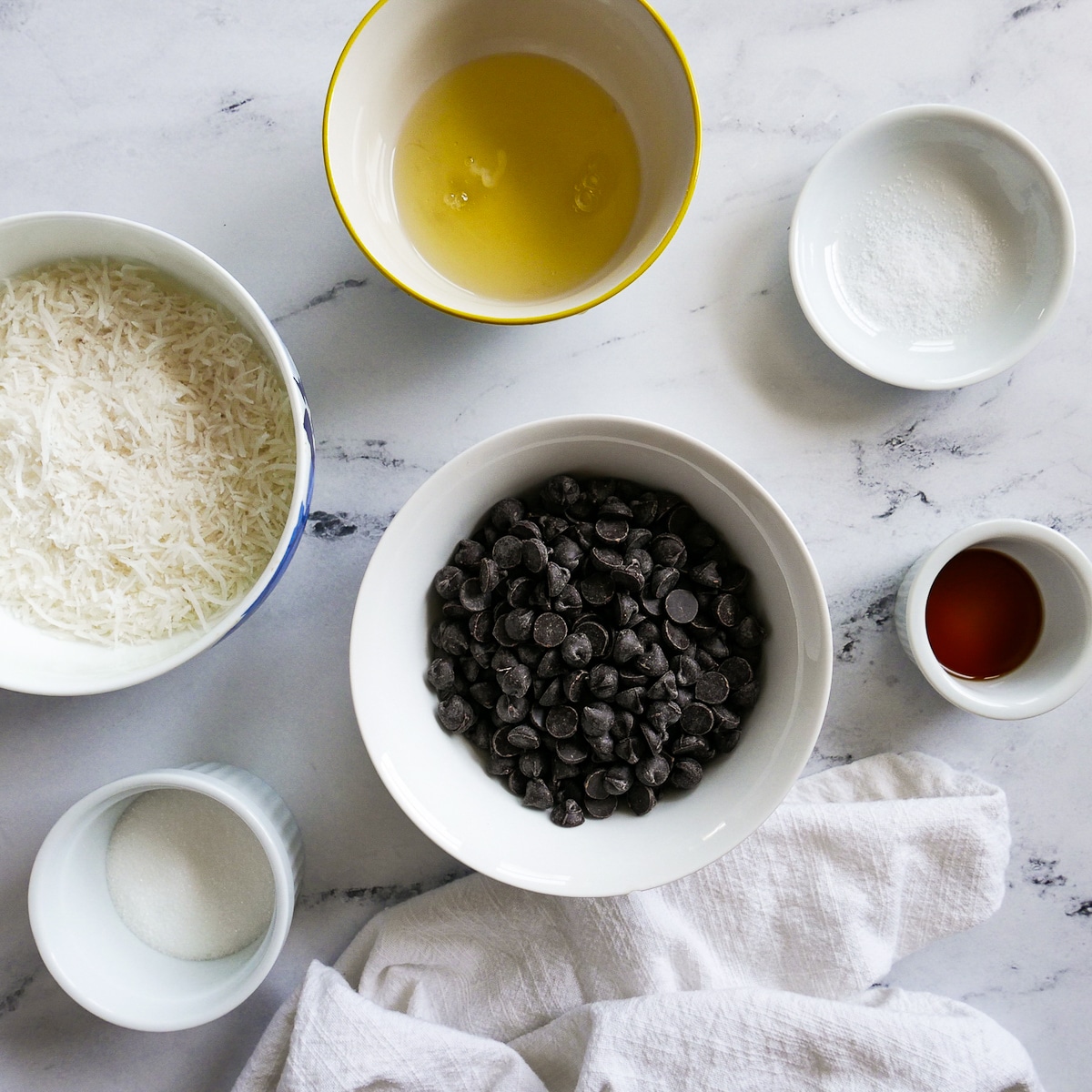 macaroon ingredients arranged on a table.