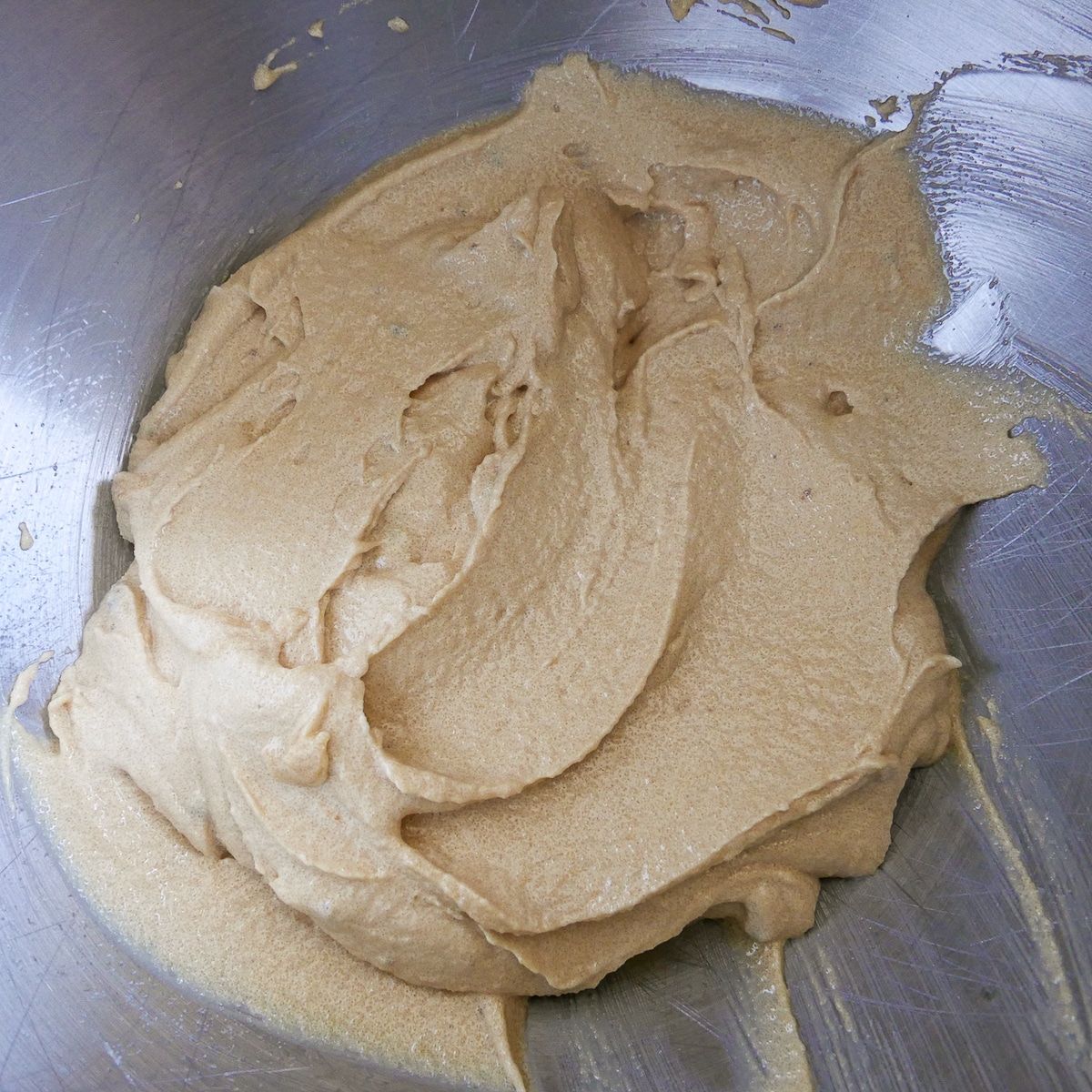 vegan butter, sugar, and vanilla whisked together in a mixing bowl.