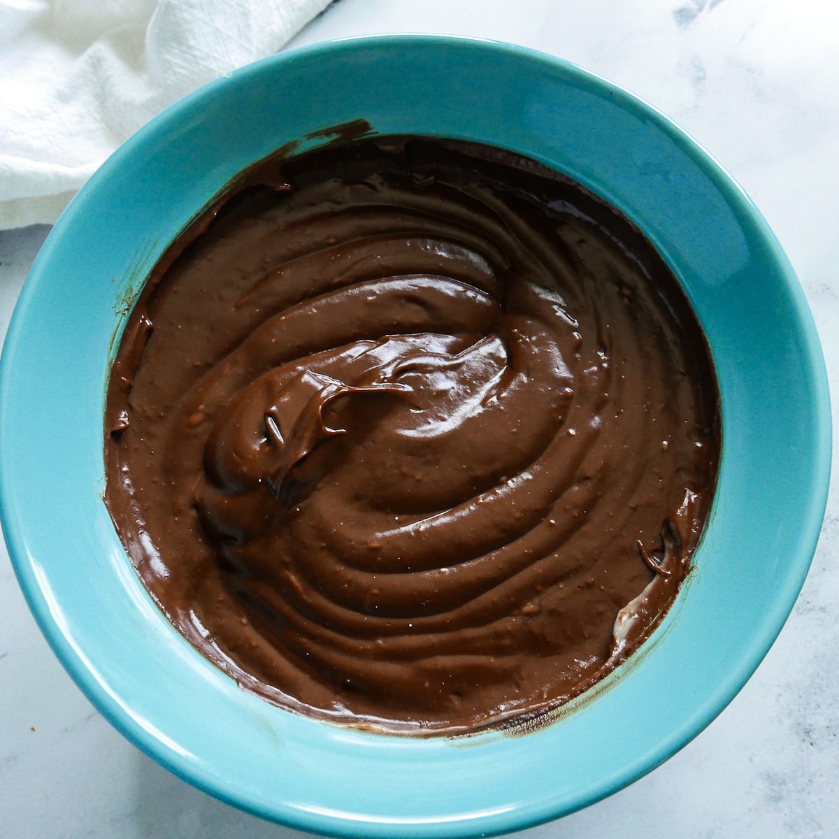 chocolate pudding poured into bowl.