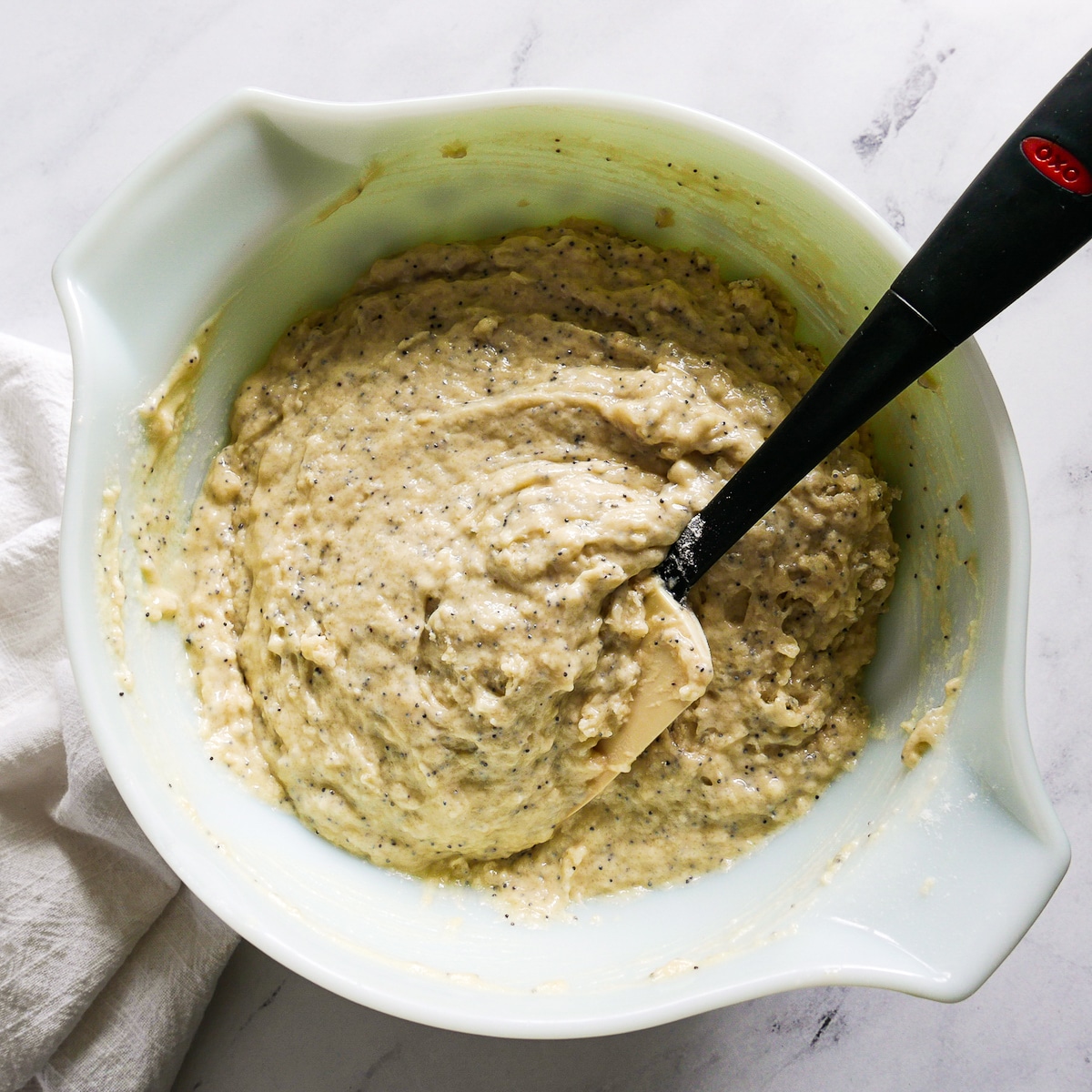 wet-ingredients-mixed-in.jpg Wet ingredients whisked into dry ingredients in a mixing bowl.