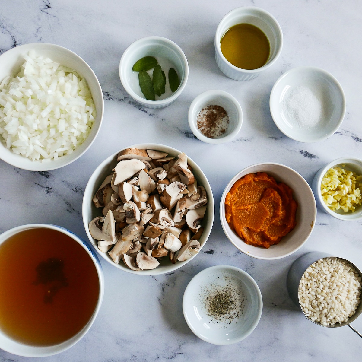 risotto ingredients arranged on a table.