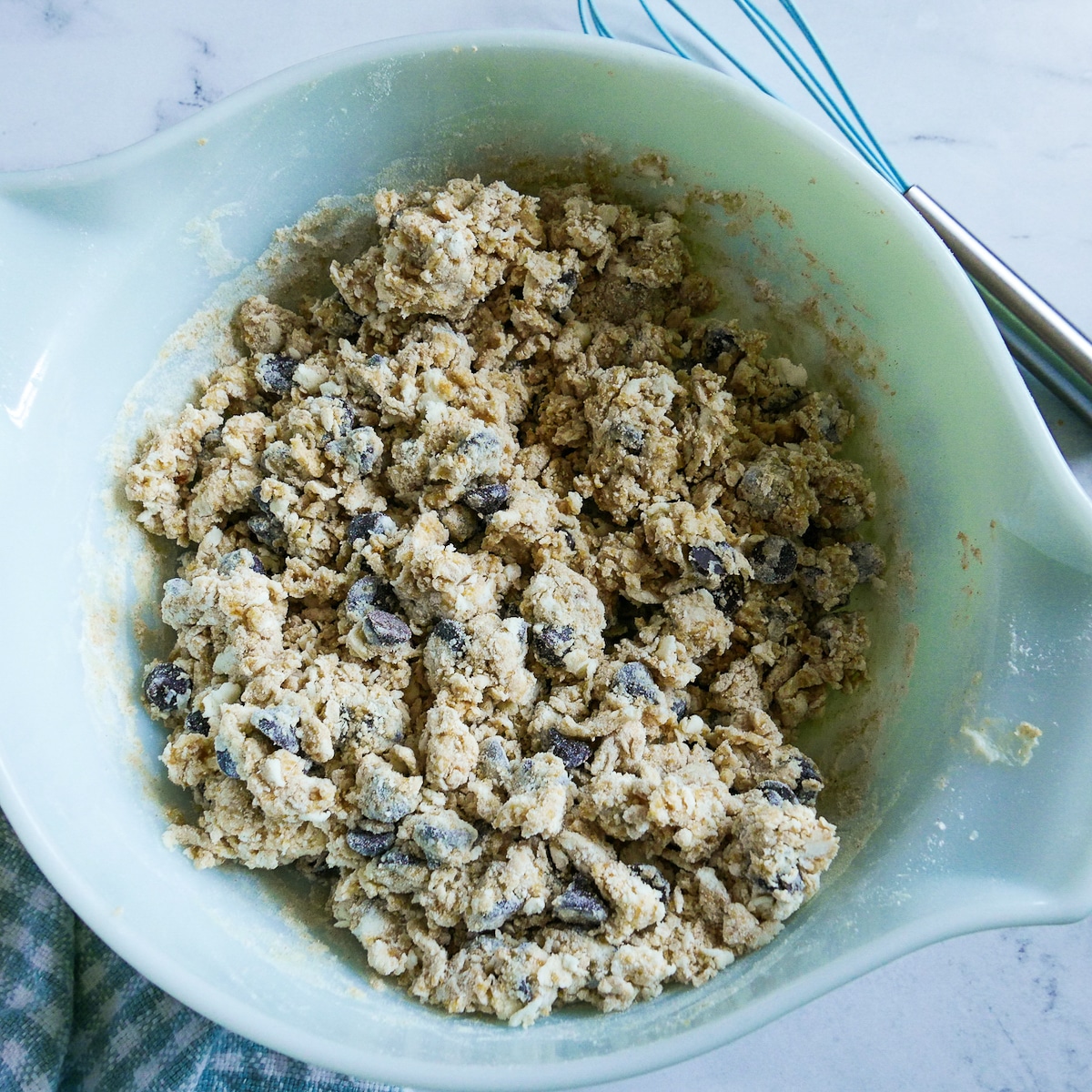 scone-dough-in-bowl.jpg wet ingredients mixed into dry ingredients in a bowl.