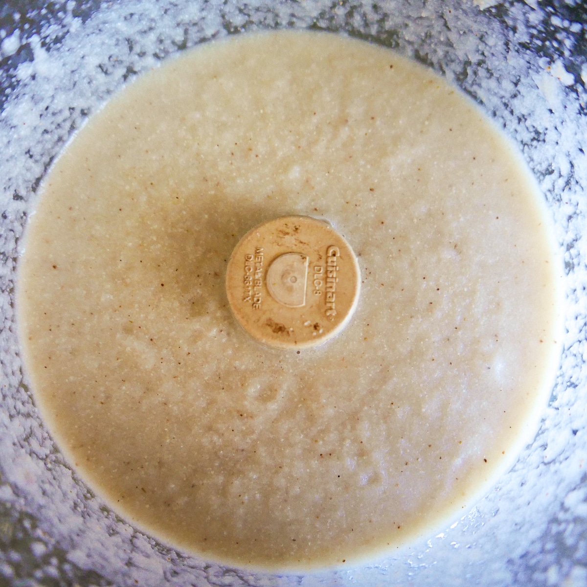 food-processor-blending-soup.jpg Blended soup ingredients in a food processor.