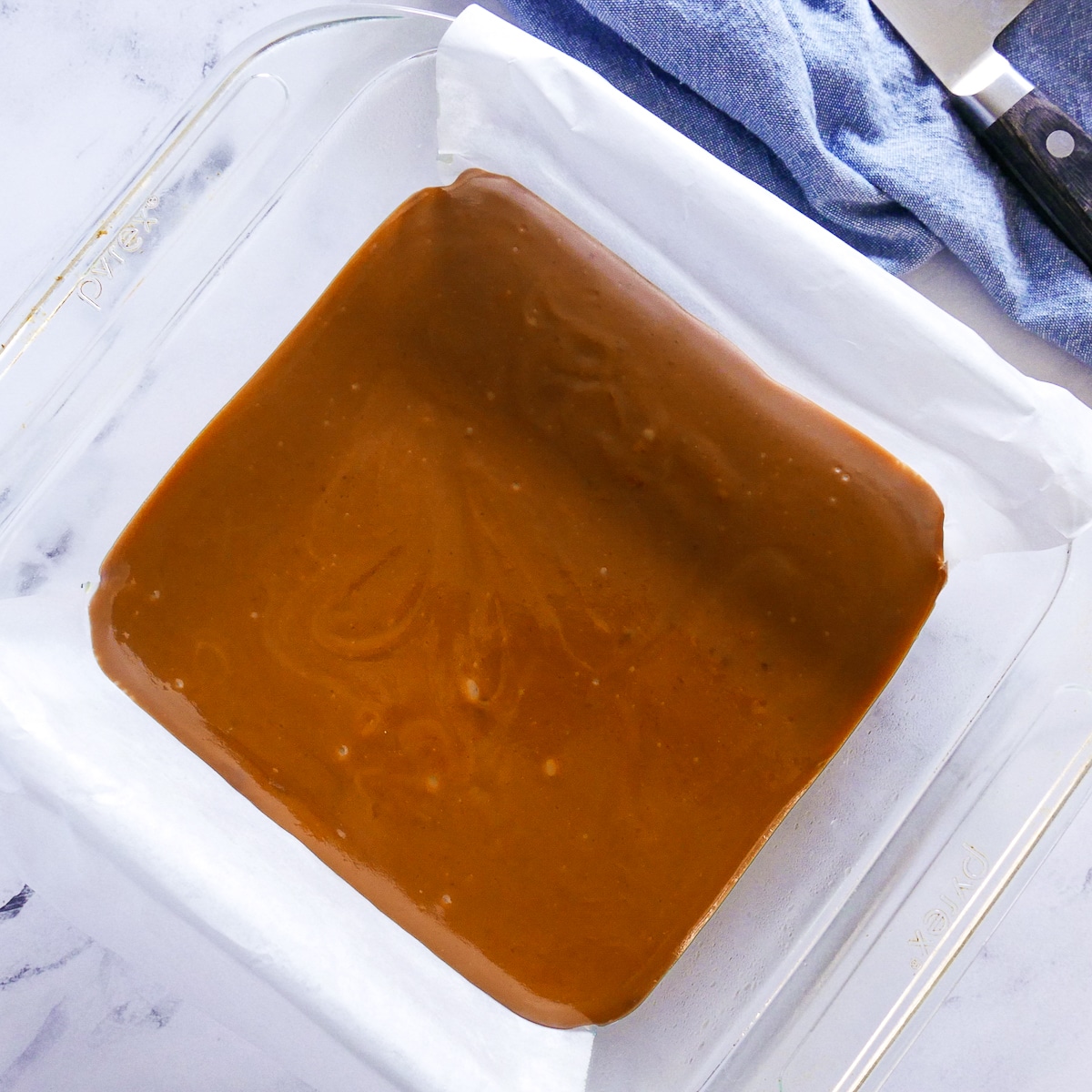 salted caramel poured into prepared baking dish.