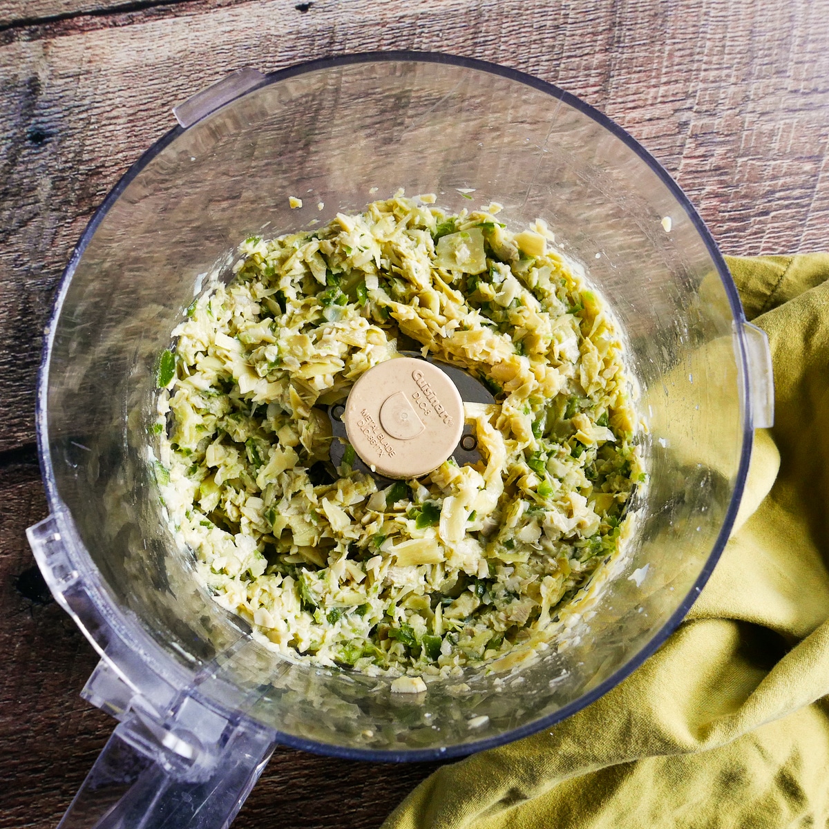 artichokes and jalapenos chopped in a food processor.