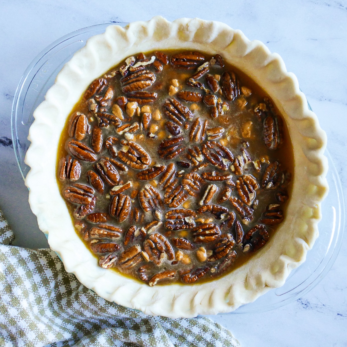 pie filling poured into pie crust.