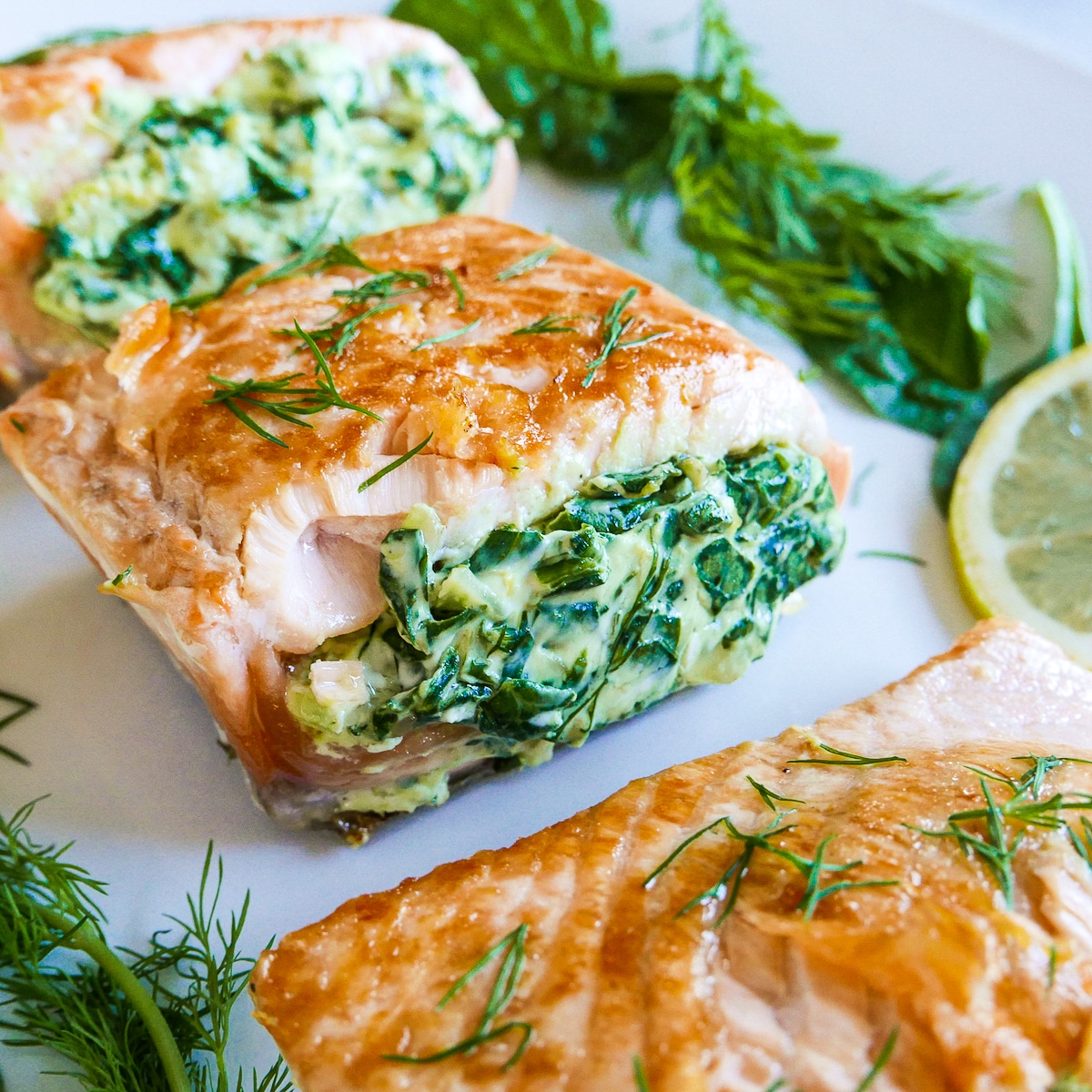 spinach mixture stuffed into side of salmon fillet.