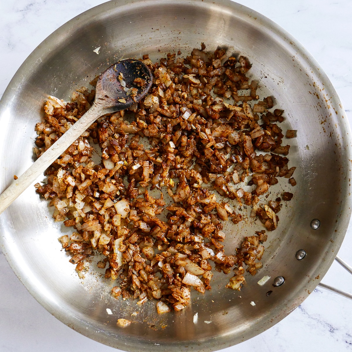 mexican spices added to pan.